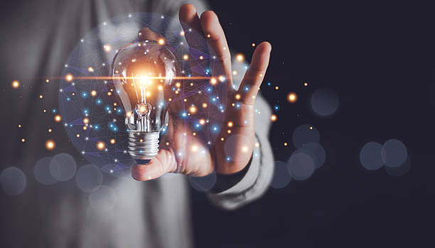 istock Businessman's hand holding illuminated light bulb with network connection line, new idea creativity concept, Innovation and inspiration for business administration, brainstorming. 2237688384