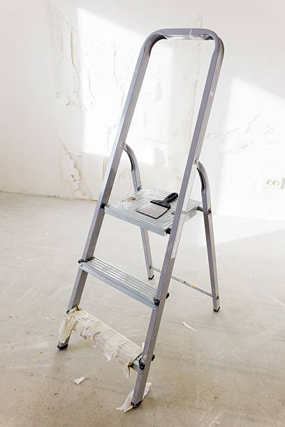 istock Ladder placed on a bare floor ready for painting or renovation work 2237689686