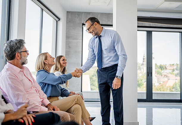 istock Business colleagues shaking hands during meeting in office 2237689970