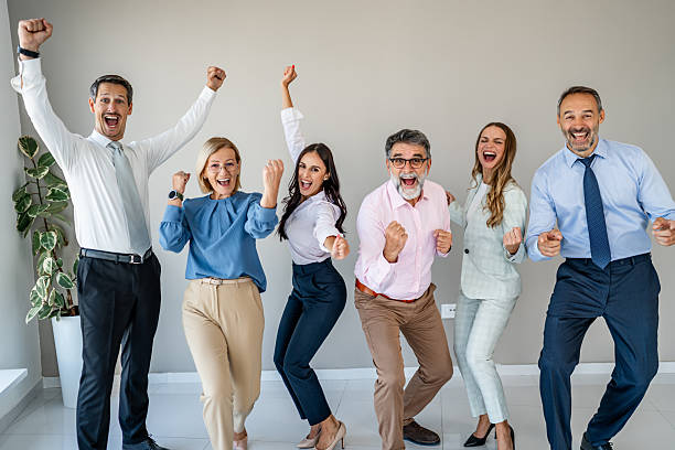 istock Business team cheering celebrating success and achievement 2237690573