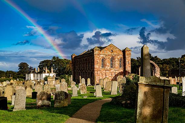 istock Autumn Double Rainbows Over Coldingham Christian Church. 2237695804
