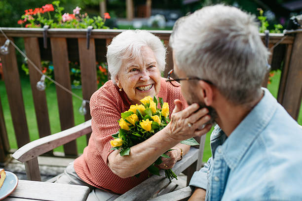 istock Mature son spending time with elderly mother, drinking coffee and talking. 2237697802