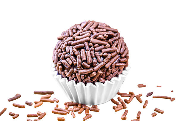 istock brigadeiro, Brazilian chocolate sprinkles sweet, white solid background, copyspace 2237698653