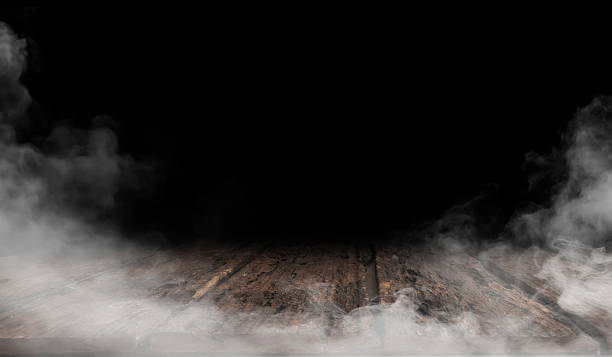 istock On a black background, an empty wooden table with smoke floats up. Empty space for displaying your products, with a smoke float up on a dark background. Space available for displaying your products. 2237703451