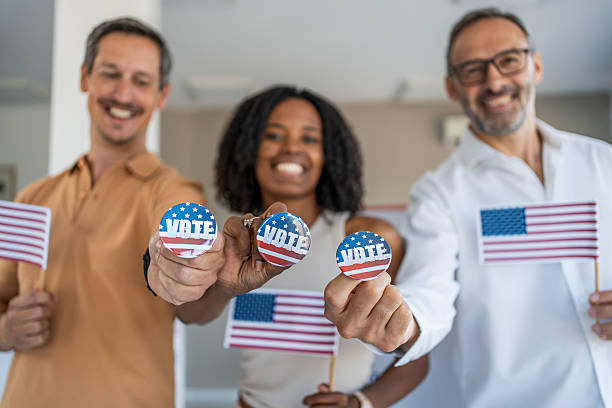 istock Diverse adults voting, celebrating American democracy 2237710896