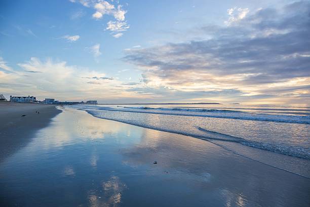 istock Sunrise Morning Sky Reflection at Low Tide Old Orchard Beach Maine 2237713032