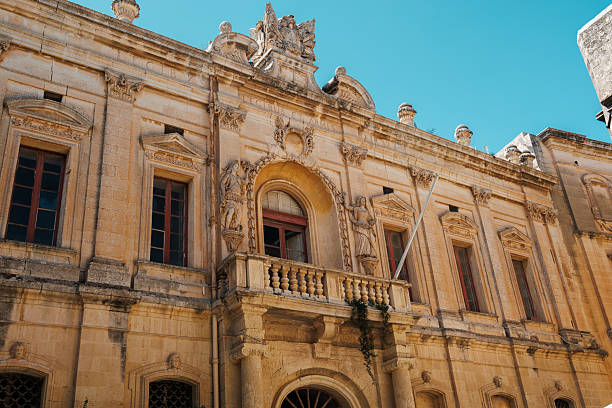 istock Historic Maltese Building Facade With Ornate Architecture And Balcony Under Clear Blue Sky 2237721502