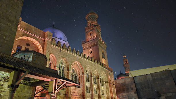 The Mosque of Ibn Tulun is a historic mosque in Cairo, Egypt. Built between 876 and 879.  This photo is taken on a clear evening from the Souk.