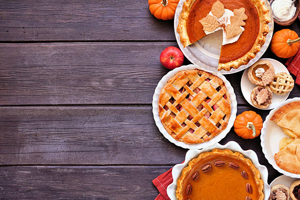 istock Homemade fall pie side border. Above view on a dark wood background. 2237731724