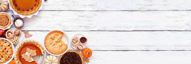 istock Homemade fall pie corner border. Overhead view on a white wood background. 2237731934