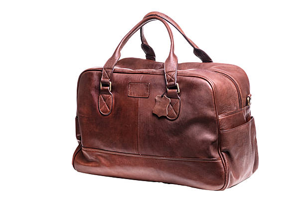 istock Modern Large leather bag for travel close-up. On a white background. 2237732860