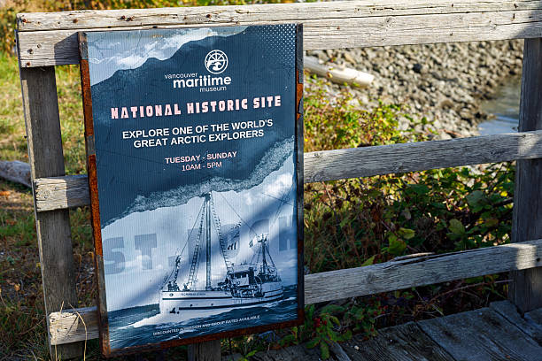 Vancouver, Canada - September 15, 2025: A sign at Vancouver Maritime Museum's National Historic Site, promoting exploration of great Arctic explorers with a vintage ship image