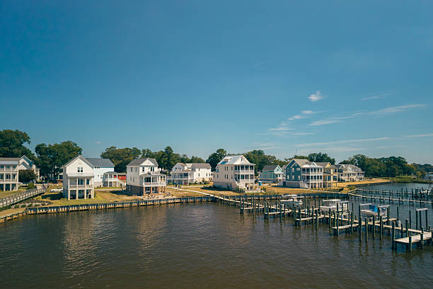 istock New Water Front Coastal Homes - Dock Boats and Boardwalk 2237742237