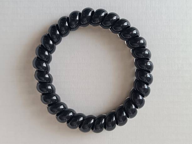 Black spiral hair tie. Hair accessory.