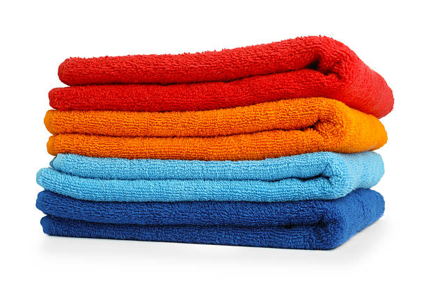 istock Stack of colorful terry towels isolated on white 2237745937