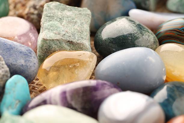 istock Different beautiful healing stones on table, closeup 2237745938