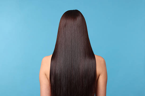 istock Woman with beautiful smooth hair after lamination procedure on light blue background, back view 2237751204