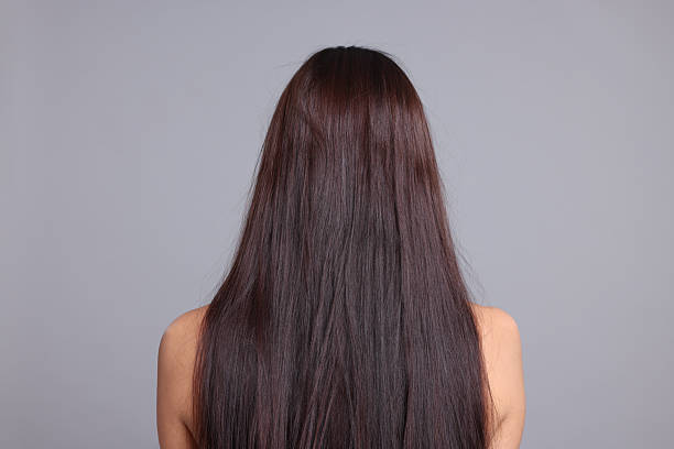 istock Woman with damaged hair before lamination procedure on light grey background, back view 2237751223