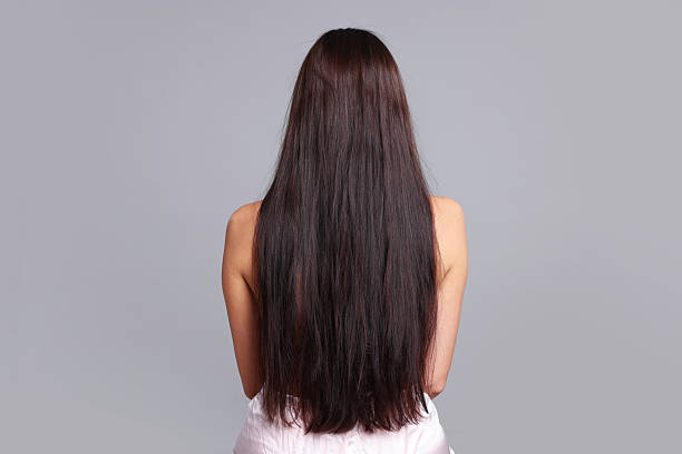 istock Woman with damaged hair before lamination procedure on light grey background, back view 2237753047