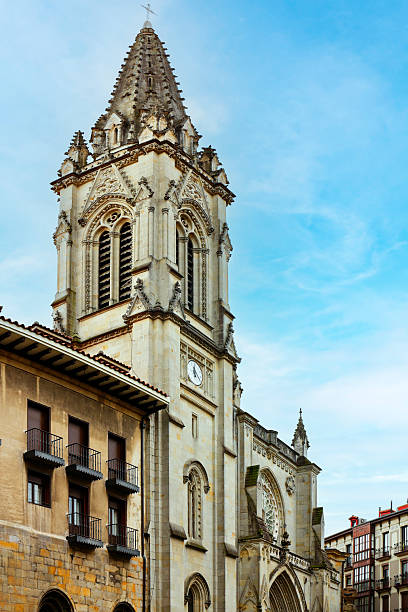 The Gothic Bilbao Cathedral with its ornate bell tower, located in the old town of Bilbao, Basque Country, Spain.