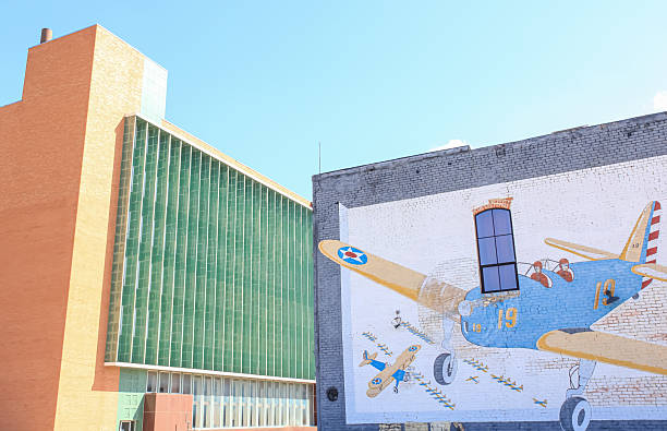 A colorful view of the townscape of Corsicana, Texas with a mural of the Air Force Base that used to be there