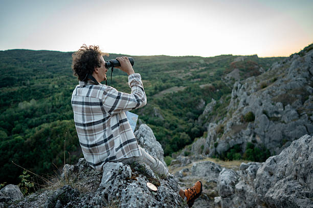 Tourist touring the city. Tourist observing the city from the hill. Young man touring the city of Salta, Argentina. Tourist on San Bernardo Hill, Salta, Argentina
