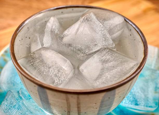 istock ice and water in a cup 2237778333