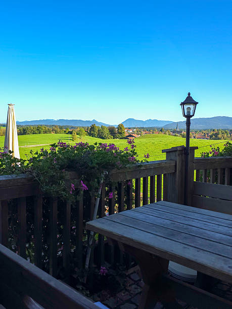 istock Scenic Countryside View from Rustic Outdoor Deck 2237791454