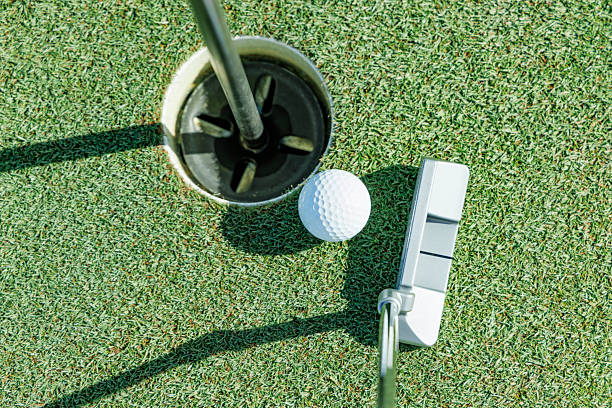 istock Beautiful green golf course and ball 2237791901