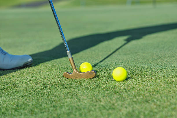 istock Beautiful green golf course and ball 2237791936