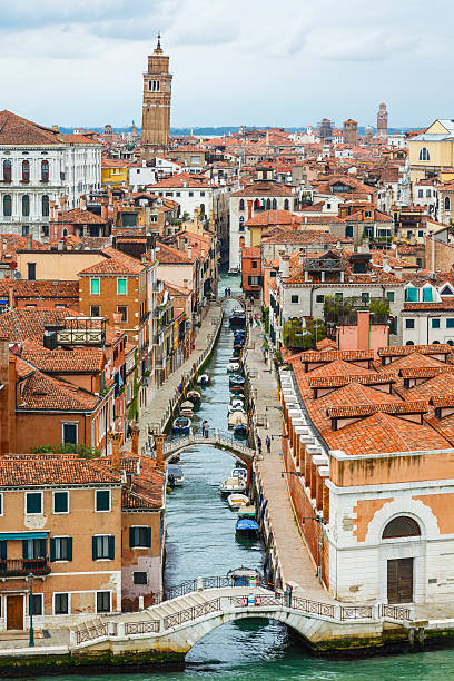 Travel destination: High angle view of Venice canal. Italy. The image captures the architectural beauty of Venice.