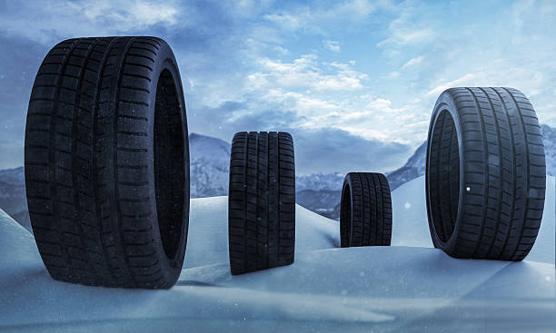 istock Car tires on a road with snow and ice 2237802427