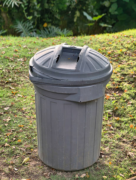 istock Outdoor Trash Can with Lid in Grassy Park Setting. 2237803647