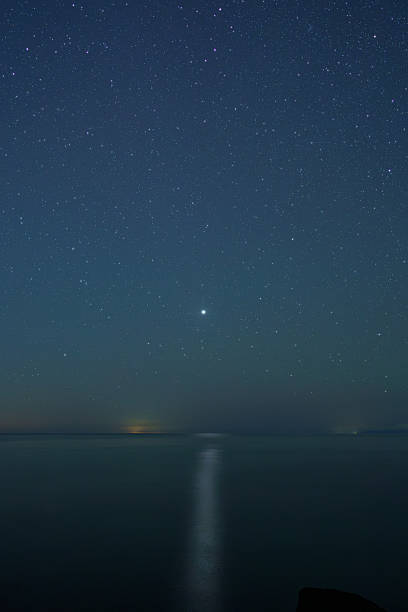 istock A path of light across the starry sky and sea 2237808396