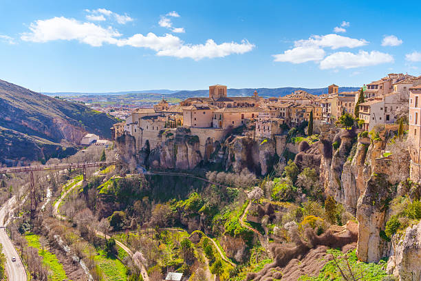 istock Cuenca cityscape with hanging houses, cliffs, valley and bridge in spring 2237808612