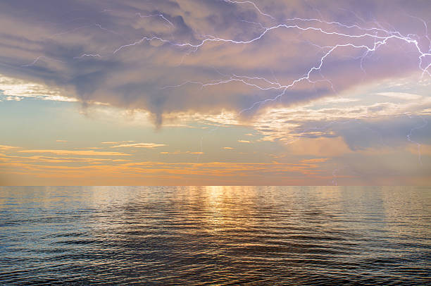 Beautiful landscape with lightning over the stormy sea