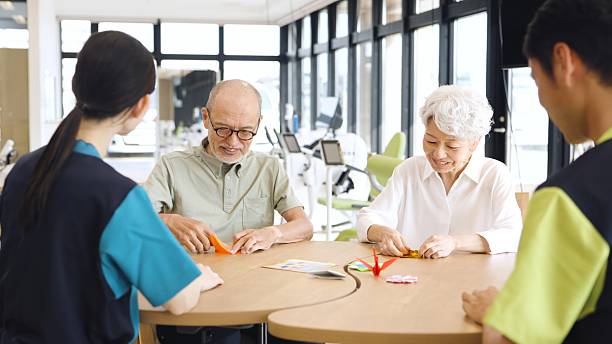 istock Elderly Asian people receiving explanation about nursing care facilities 2237810863