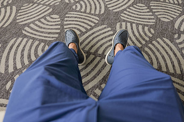 Blue crocs isolated on white background