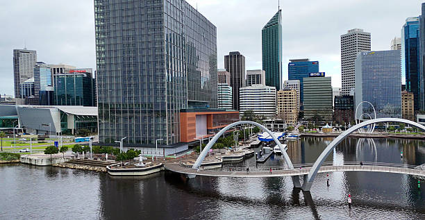 istock Dramatic sunset sky over Elizabeth Quay bridge with Perth city skyline and waterfront 2237829791