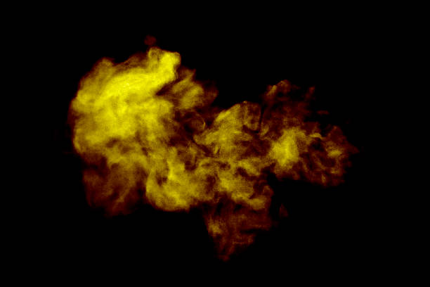Yellow smoke cloud isolated on black background, abstract texture for fire effect, toxic gas, pollution, or fantasy atmosphere, perfect for design, environment themes, and creative visual concepts.