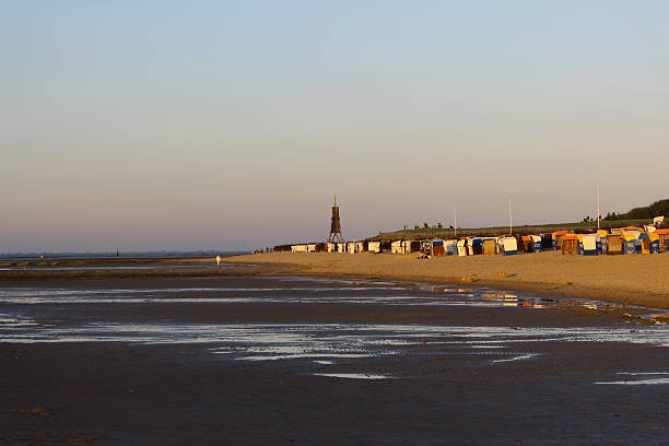 Low tide at sea: beach landscape at sunset in Cuxhaven