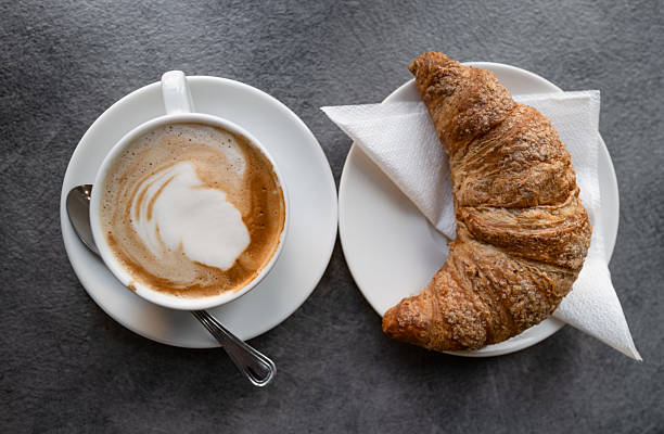 istock Italian Breakfast with Cappuccino and Croissant 2237845943