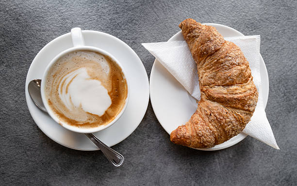 istock Italian Breakfast with Cappuccino and Croissant 2237845993