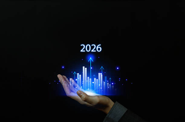 istock Business hand holding glowing digital growth chart with rising bars and arrows, symbolizing future vision, success, financial forecast, business strategy, planning, and economic growth for year 2026. 2237847579