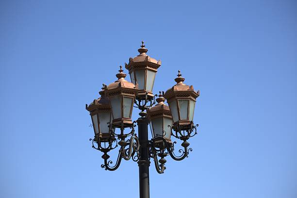 istock An antique cast iron lantern with five lamps against a blue sky 2237855778