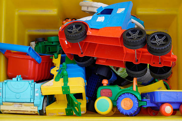 istock Children's toys in a yellow box 2237865799