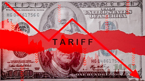 istock A hundred-dollar bill with a red downward arrow, the word 