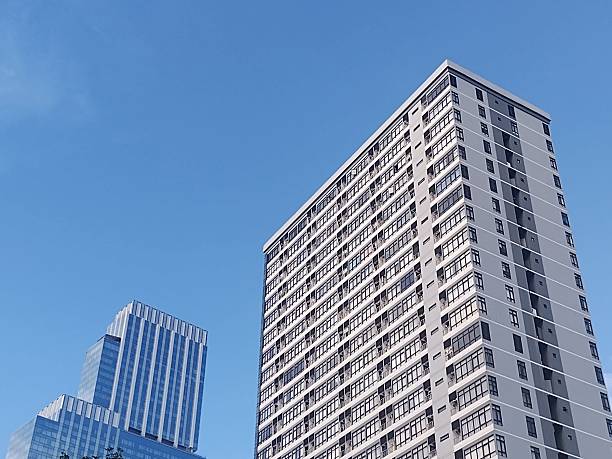 istock Urban High-Rises Under a Clear Blue Sky 2237866875