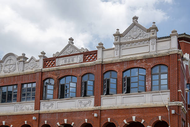 istock Detailed View of a Red Brick Building with Ornate Architectural Features 2237868714