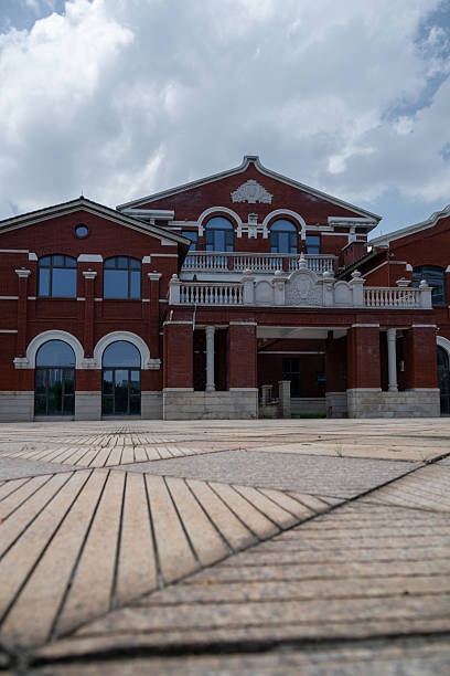 The Facade of a Red Brick Building with Classical Architectural Elements